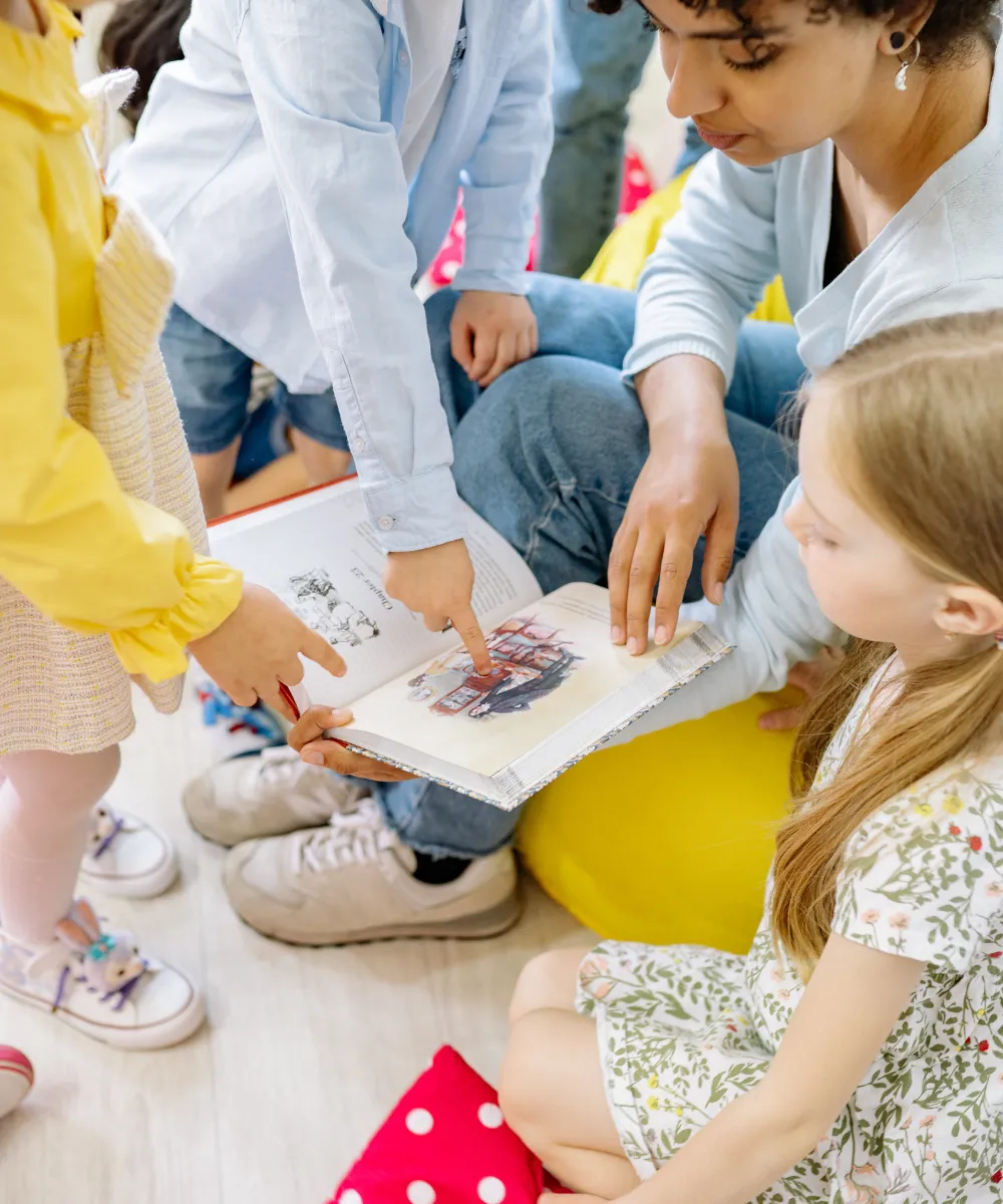 A parent researching local preschool and daycare options on a laptop